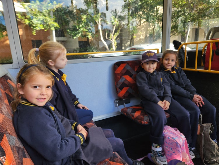 Kindergarten students on the bus on their way to an excursion